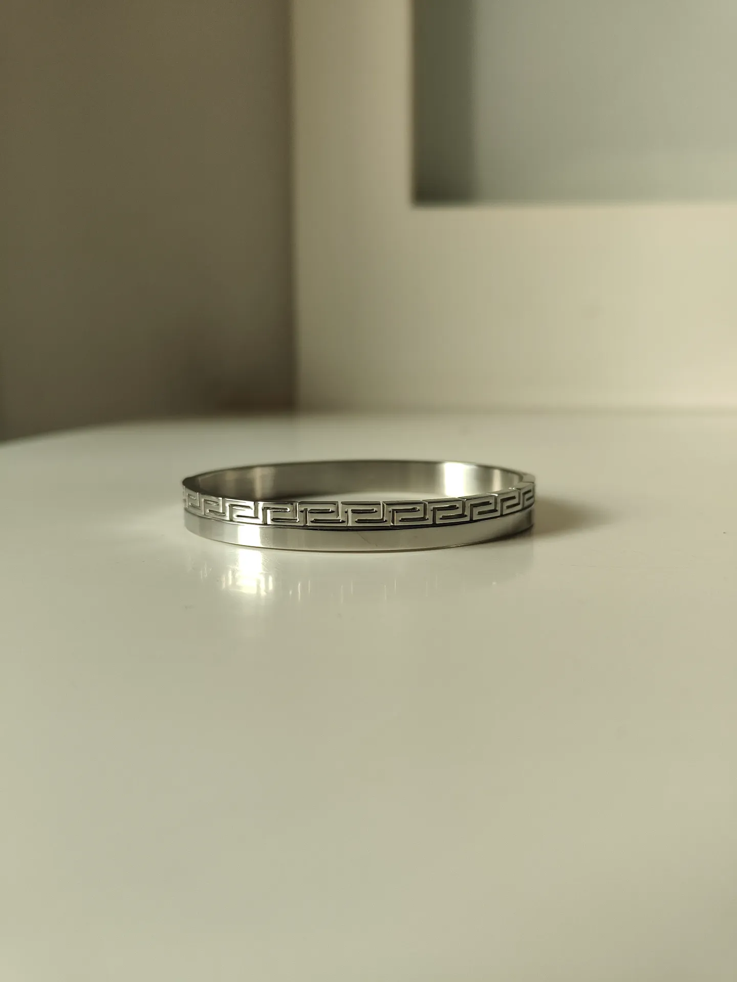 Sleek Silver Twist Bangle