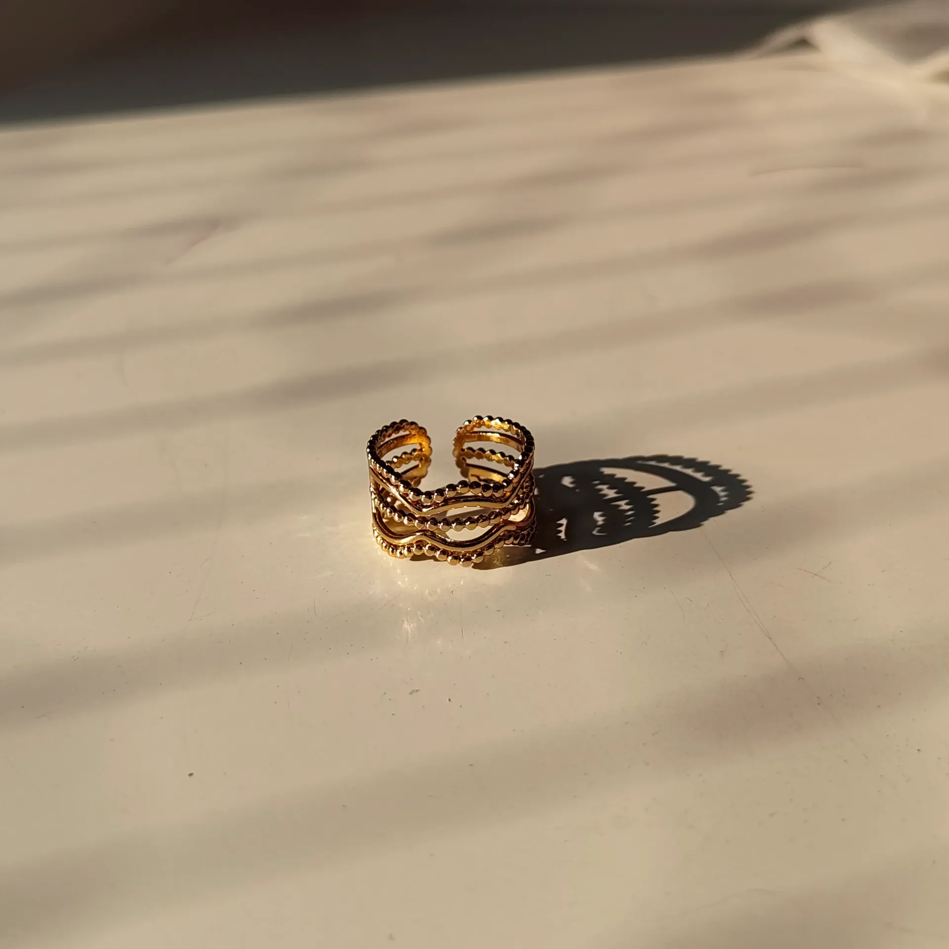 The Gilded Wave Stacker Ring
