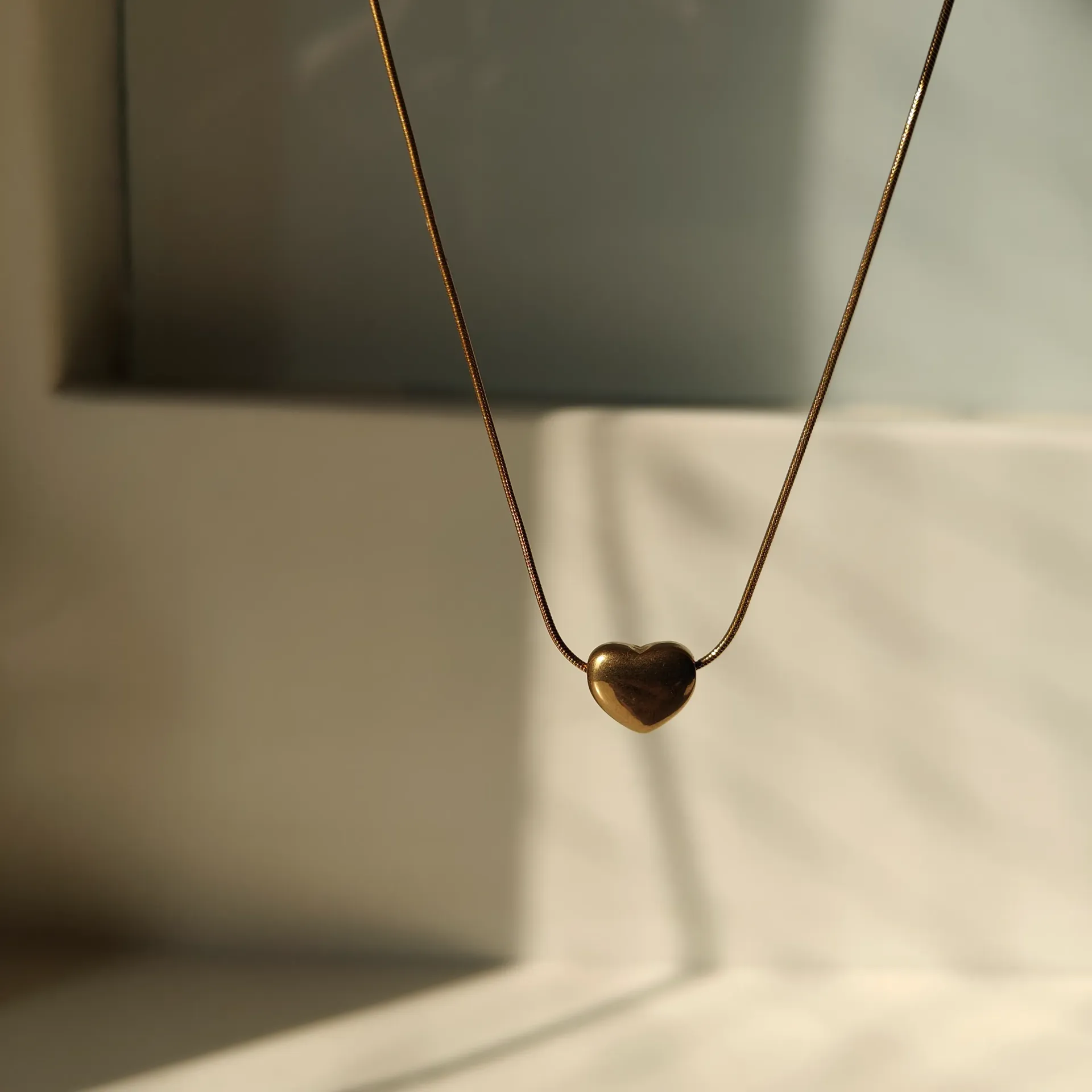 Golden Puffed Heart Snake Chain Necklace