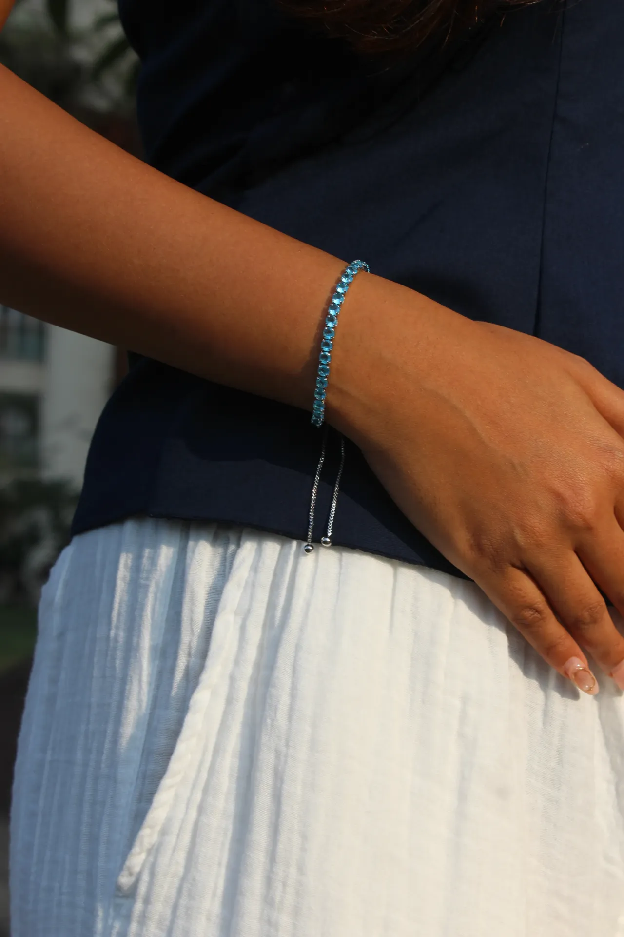 The Orbit Aqua Tennis Bracelet